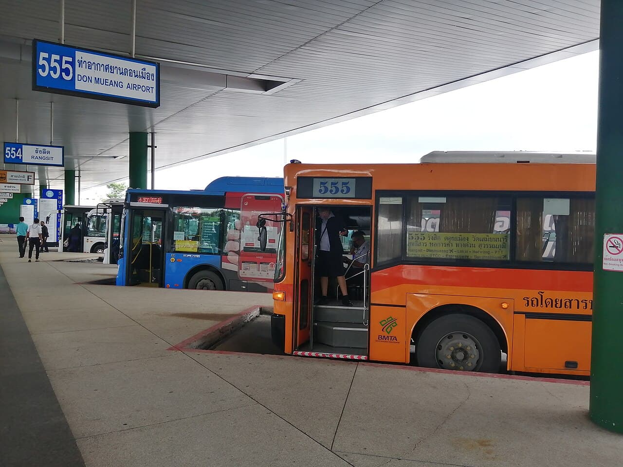 Buses inside the public transportation center at Suvarnabhumi Airport.